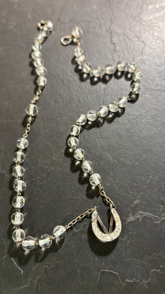 Collier chapelet et fer à cheval