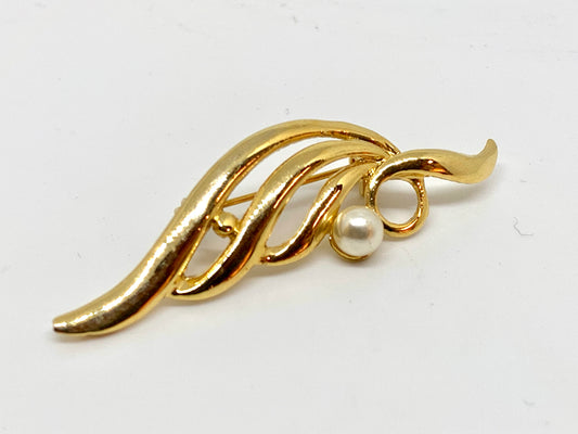 Broche vintage à volutes et perle